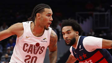 Cleveland Cavaliers guard Jaylon Tyson drives to the basket as Washington Wizards forward Justin Champagnie defends.