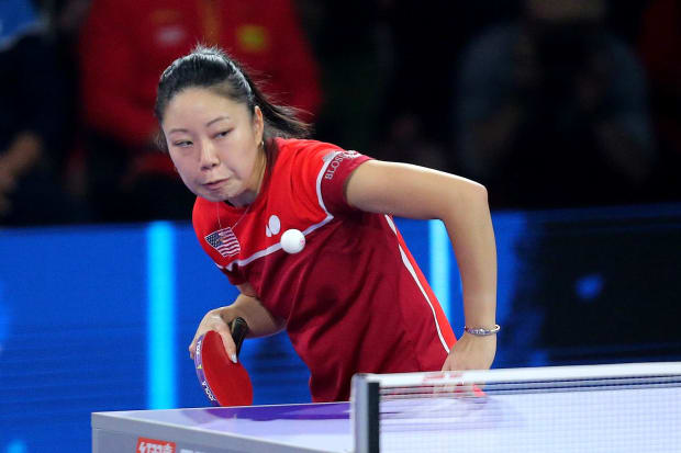 Lily Zhang of the United States competes in a mixed doubles semifinal during the 2021 World Table Tennis Championships Finals