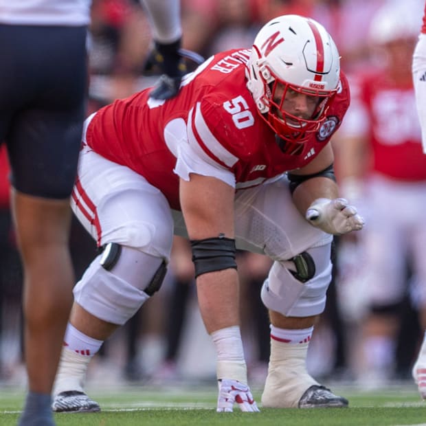 Nebraska offensive lineman Rocco Spindler prepares to block against Michigan.