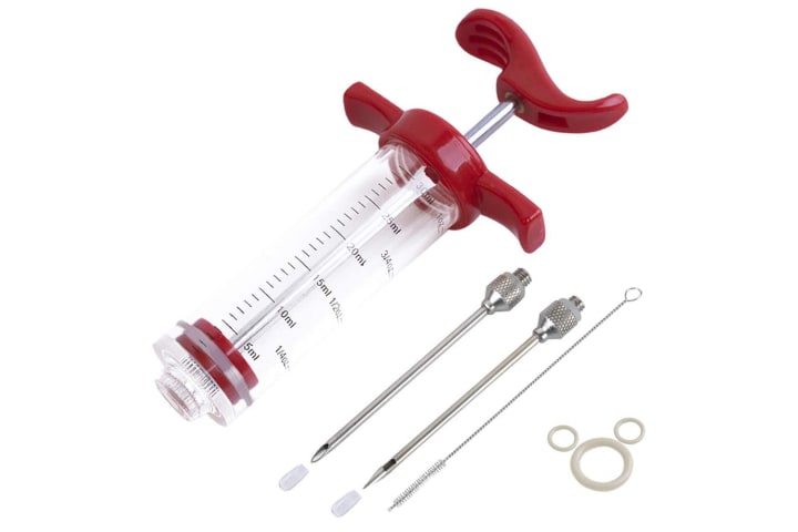 Ofargo marinade injector syringe on a white background