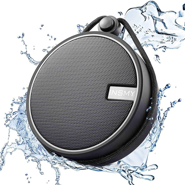 INSMY C12 IPX7 Waterproof Shower Bluetooth Speaker on a white background with water splashing