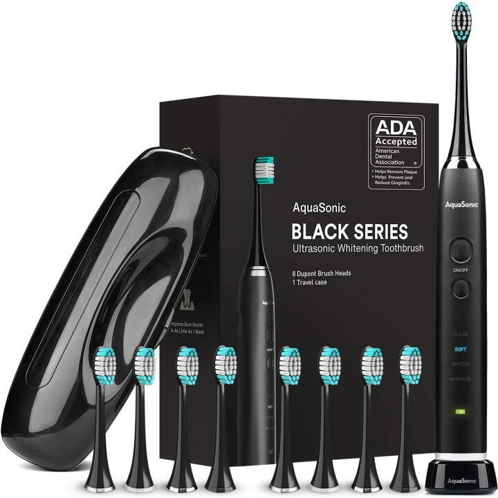 One of the most popular products of 2022, the AquaSonic Black Series Ultra Whitening Toothbrush, is pictured.