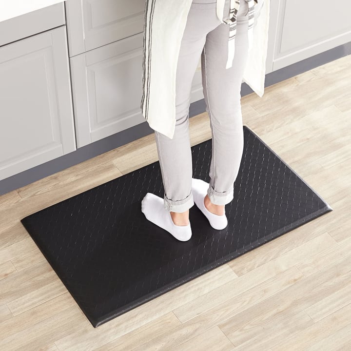 Best Amazon Basics kitchen products under $50: Amazon Basics Anti-Fatigue Standing Comfort Mat is pictured.
