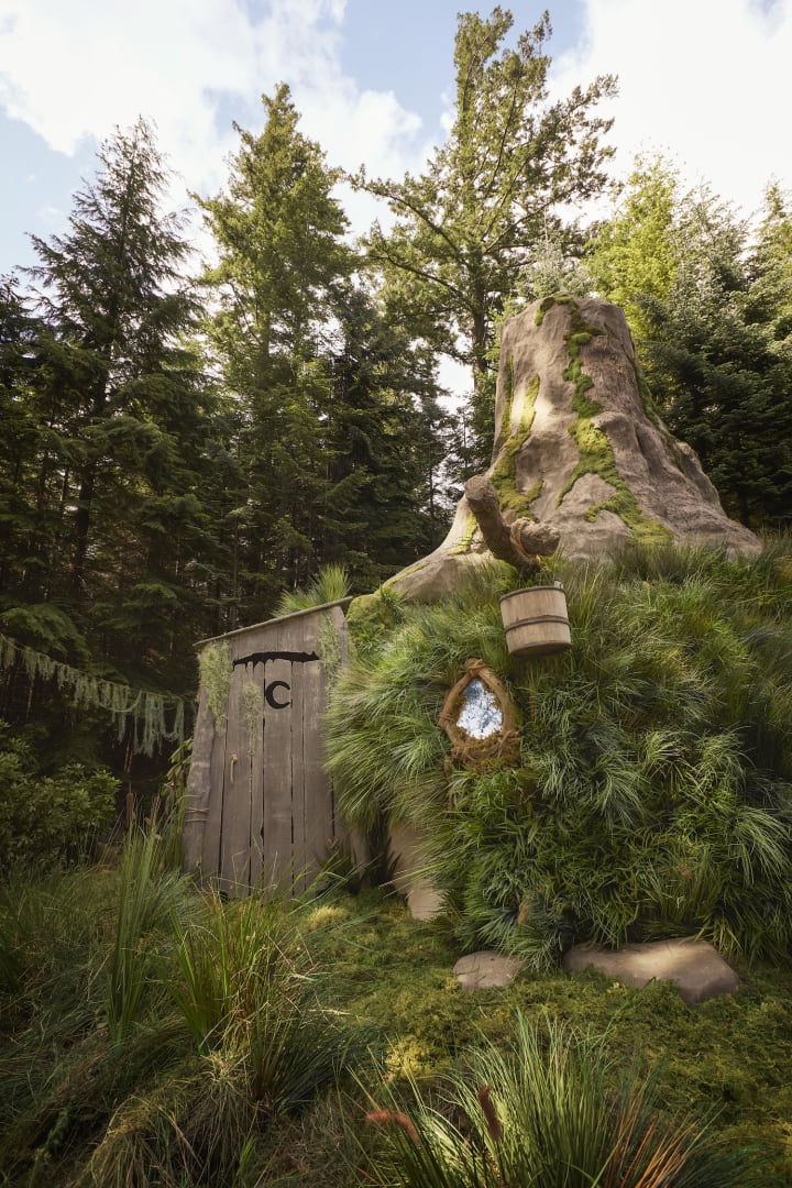 outhouse at shrek's swamp on airbnb