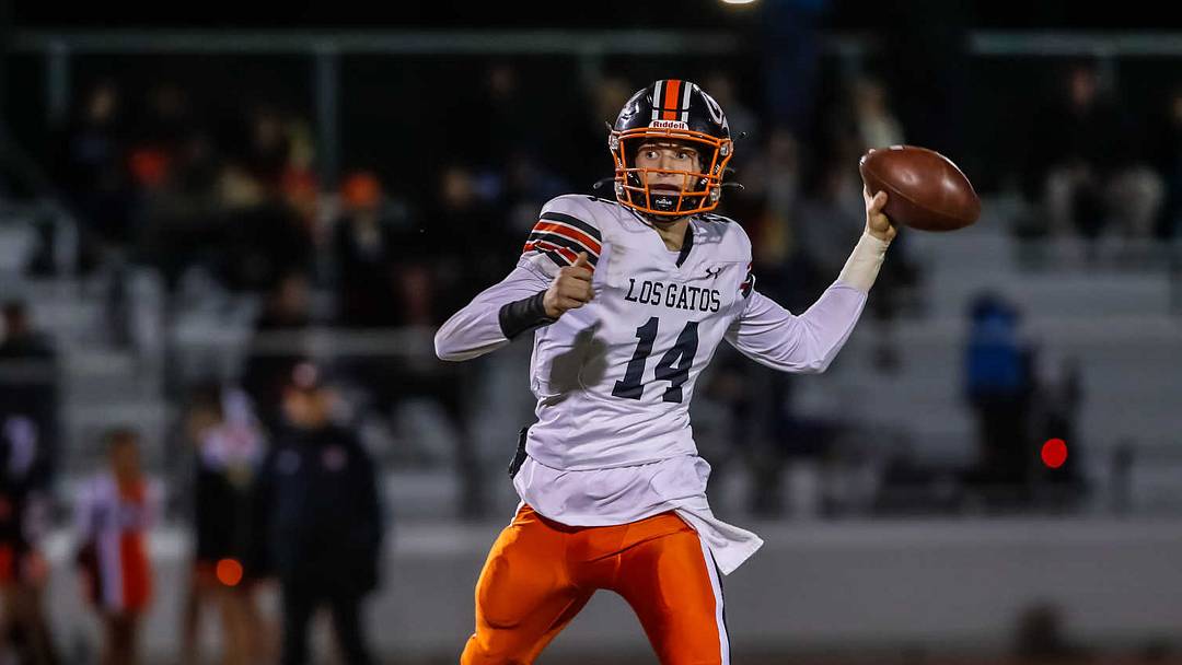 Los Gatos senior quarterback Scotty Brennan (14), shown here in a game versus Palo Alto in 2024, Saturday threw for more than 300 yards and three touchdowns in the Wildcats' stirring 35-28 win at third-seed Riordan in a CCS Division 1 semifinal game. 
