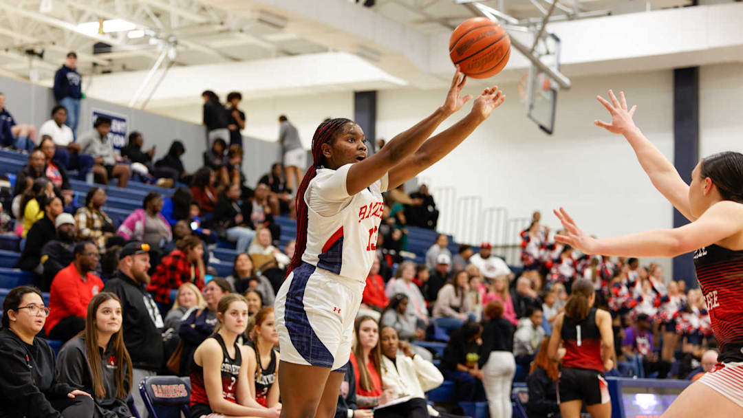 Denton Ryan sophomore Jamyla Anderson shoots a 3-pointer against Colleyville Heritage on Jan. 28.