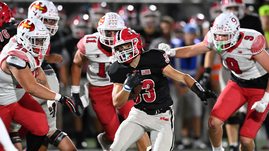 New Canaan defeated Cheshire on Saturday night with a final score of 34-13 to claim the Class L championship. New Canaan defeated Cheshire on Saturday night with a final score of 34-13 to claim the Class L championship.