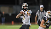 Newbury Park prolific junior quarterback Brady Smigiel, in the pocket during his team's 48-20 win over Calabasas on Oct. 10. 