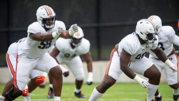 Auburn Tigers defensive line runs through drills during Auburn Tigers football practice at the Woltosz Football Performance Center at in Auburn, Ala., on Monday, April 3, 2023.
