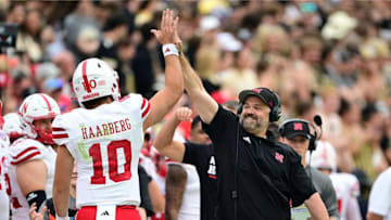 Nebraska Cornhuskers head coach Matt Rhule high fives Heinrich Haarberg