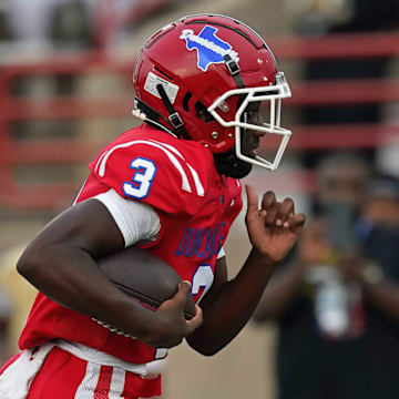 Maximus The Great Denson carries the ball for Duncanville in a game on Sept. 5 against South Oak Cliff. The No. 2-ranked Panthers lost in Week 4 to Waxahachie. 