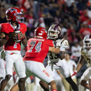 North Shore quarterback Kaleb Maryland drops back against Summer Creek on November 7, 2025.