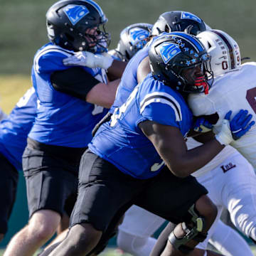 The North Crowley offensive line blocks against Midland Legacy.