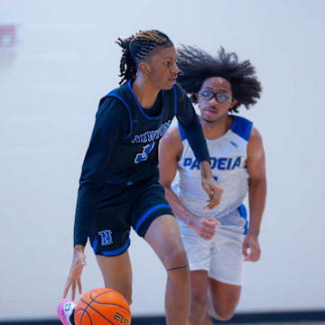 The Newton Rams defeated Alcovy on Friday night with a final score of 53-49.