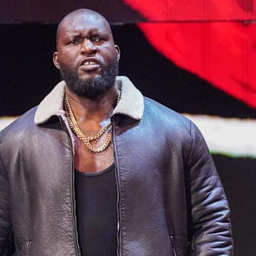 Omos has re-signed with WWE on a multi-year deal.