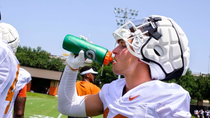 Texas defensive back Michael Taaffe grabs some water during the first fall football camp practice for the Texas Longhorns at Denius Fields on Wednesday July 31, 2024.