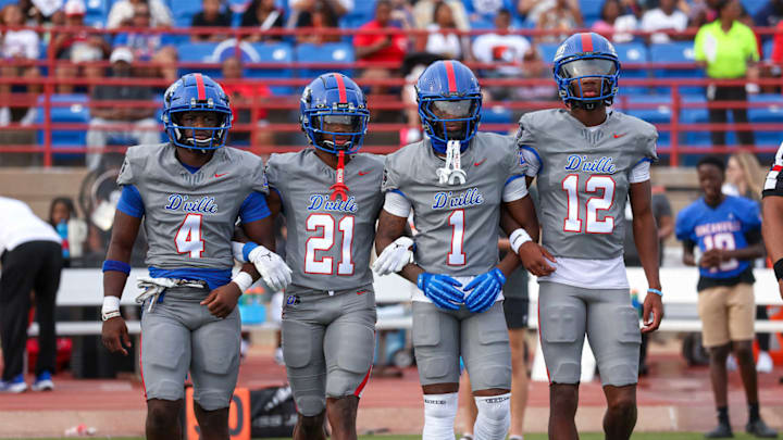 Duncanville captains take field in Texas for ranked high school showdown with Maryland's St. Frances Academy on Sept. 14, 2024.