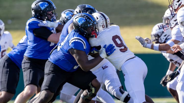 The North Crowley offensive line blocks against Midland Legacy.
