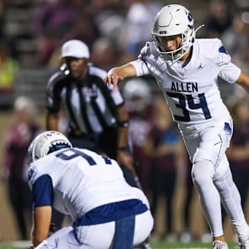Allen's Preston Hurless boots a PAT in a win against Allen on Sept. 19. 