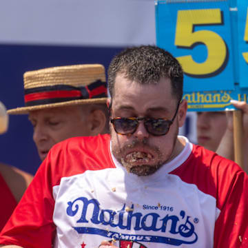 Patrick Bertoletti competes in the 2024 Nathan’s Hot Dog Eating Contest.