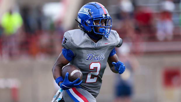 Duncanville receiver Ayson Theus runs against St. Frances Academy at Duncanville ISD Stadium.