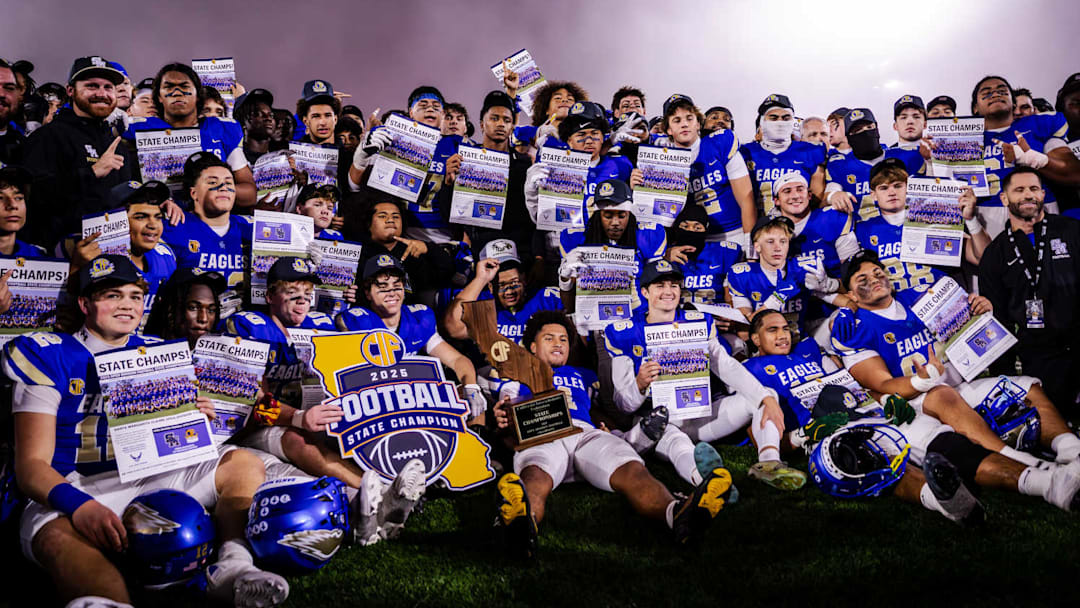 Santa Margarita poses after winning the CIF State Open Division championship with a 47-13 win over De La Salle at Saddleback College.