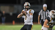 Newbury Park prolific junior quarterback Brady Smigiel, in the pocket during his team's 48-20 win over Calabasas on Oct. 10. Smigel completed 11 of 19 for 239 yards and four touchdowns, and he caught a 36-yard TD. His favorite target Shane Rosenthal had six catches for 167 yards and two touchdowns. 