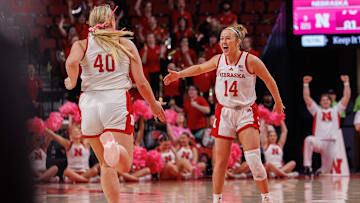 Nebraska guard Callin Hake (14) celebrates with center Alexis Markowski (40) during an overtime win over Oregon in Lincoln on Feb. 19, 2025