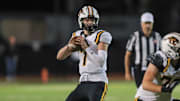 Newbury Park prolific quarterback Brady Smigiel, in the pocket during his team's 48-20 win over Calabasas on Oct. 10, 2024. Smigiel, an incoming senior headed to Michigan, completed 11 of 19 for 239 yards and four touchdowns, and he caught a 36-yard TD. Smigiel is one of 25 top-tier quarterbacks to watch in California in 2025.  