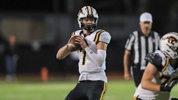 Newbury Park prolific quarterback Brady Smigiel, in the pocket during his team's 48-20 win over Calabasas on Oct. 10, 2024. Smigiel, an incoming senior headed to Michigan, completed 11 of 19 for 239 yards and four touchdowns, and he caught a 36-yard TD. Smigiel is one of 25 top-tier quarterbacks to watch in California in 2025.  
