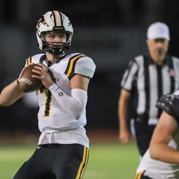 Newbury Park prolific quarterback Brady Smigiel, in the pocket during his team's 48-20 win over Calabasas on Oct. 10, 2024. Smigiel, an incoming senior headed to Michigan, completed 11 of 19 for 239 yards and four touchdowns, and he caught a 36-yard TD. Smigiel is one of 25 top-tier quarterbacks to watch in California in 2025.  