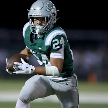 De La Salle running back Duece Jones-Drew runs against Serra in 2024. The Spartans haven't lost a team in the North Coast Section since 1991, a remarkable stretch of 282 games (281-0-1) and 32 straight titles. They are the No. 1 seed heading into Friday's opener against San Ramon Valley, a team it defeated 56-7 on Oct. 24. | Dennis Lee