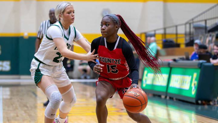 Koutze senior Jada Skipper, right, dribbles against East Chambers during a Feb. 6 game. Kountze plays in the Class 3 Division II finals on Feb. 28.