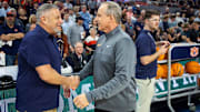 Auburn Tigers head coach Bruce Pearl and Tennessee Volunteer head coach Rick Barnes shake hands before Auburn Tigers take on the Tennessee Volunteers at Neville Arena in Auburn, Ala., on Saturday, March 4, 2023.