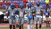 Duncanville captains take field in Texas for ranked high school showdown with Maryland's St. Frances Academy on Sept. 14, 2024.