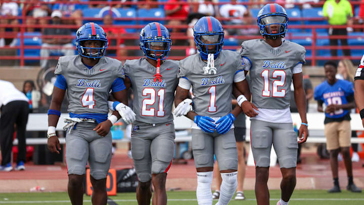 Duncanville captains take field in Texas for ranked high school showdown with Maryland's St. Frances Academy on Sept. 14, 2024.