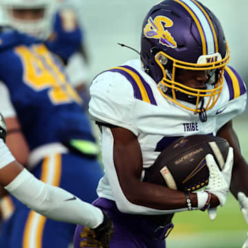 Sanger running back Reggie Jones ecliped the 2,000-yard mark during a 91-56 win against Farmersville on Nov. 6. 