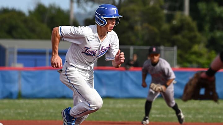 Tamalpais (white) lost this 2-0 league game to Redwood, but the Red Tailed Hawks have advanced to the North Coast Section Division 2 quarterfinals Saturday (May 24) to play at MCAL rival San Marin at 1 p.m.