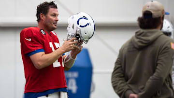 Indianapolis Colts quarterback Philip Rivers (17) puts his helmet on Wednesday, Dec. 10, 2025, during practice at the Colts training facility in Indianapolis.