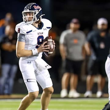 Denton Ryan quarterback Quin Henigan threw four touchdowns in a bi-district win against Fort Worth Chisholm Trail. 