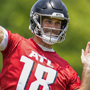 Jun 11, 2025; Atlanta, GA, USA; Atlanta Falcons quarterback Kirk Cousins (18) passes during Minicamp practice at Children's Healthcare of Atlanta Training Ground. Mandatory Credit: Dale Zanine-Imagn Images