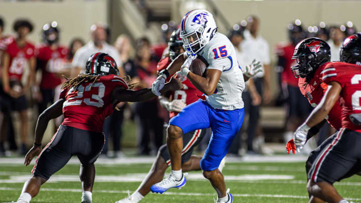 Braylon Lane from C.E. Kings runs after a catch against Goose Creek Memorial in a game on Oct. 3, 2025