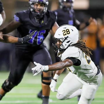 North Forney's Cordai Woodard carries the ball in a game against Forney on Sept. 26. North Forney joined the High School on SI Texas High School Football Top 25 poll this week. 