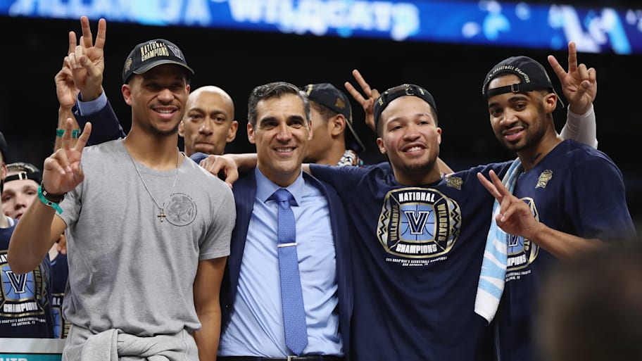 Jay Wright celebrates alongside Josh Hart and Jalen Brunson after winning the 2018 NCAA national championship. | Ronald Martinez/Getty Images