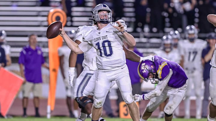 Clovis East QB Tyus Miller, shown here versus Lemoore, accounted for four touchdowns in a 38-21 win over Clovis North to finish the regular season 10-0. 