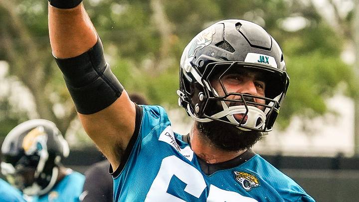 Jacksonville Jaguars guard Patrick Mekari (65) gets the fans excited during the second day of minicamp at the Miller Electric Center, Wednesday, June 10, 2026, in Jacksonville. [Doug Engle/Florida Times-Union]