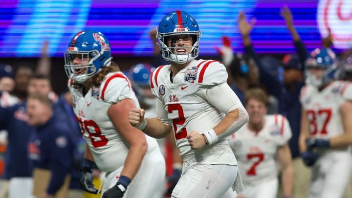 Dec 30, 2023; Atlanta, GA, USA; Mississippi Rebels quarterback Jaxson Dart (2) reacts after a touchdown throw against the Penn State Nittany Lions in the second half at Mercedes-Benz Stadium. Mandatory Credit: Brett Davis-USA TODAY Sports