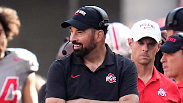 Oct 5, 2024; Columbus, OH, USA; Ohio State Buckeyes head coach Ryan Day smiles on the sideline during the first half of the NCAA football game against the Iowa Hawkeyes at Ohio Stadium.
