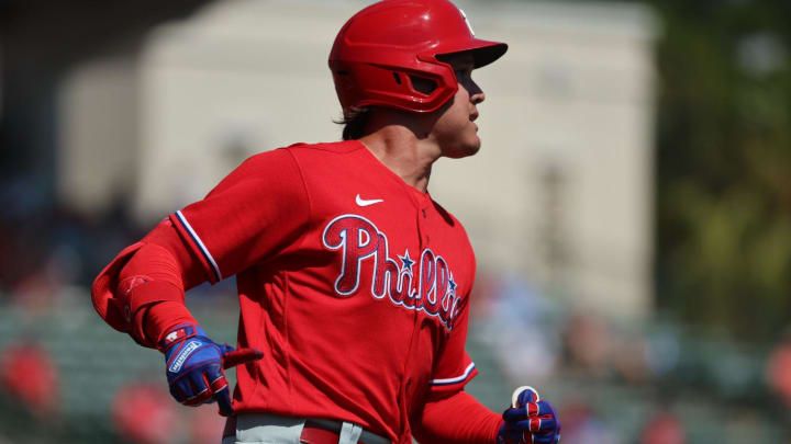 Mar 6, 2023; Sarasota, Florida, USA;  Philadelphia Phillies outfielder Simon Muzziotti (40) singles during the second inning against the Baltimore Orioles at Ed Smith Stadium