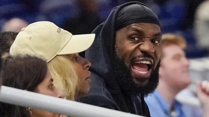 May 15, 2024; Chicago, IL, USA; LeBron James and his wife Savannah Brinson watch Bronny James participate in the 2024 NBA Draft Combine at Wintrust Arena. Mandatory Credit: David Banks-Imagn Images